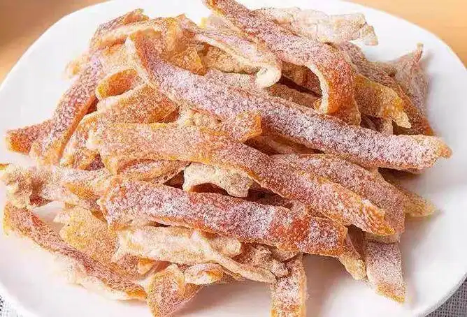 How Is Dried Tangerine Peel Processed for Commercial Snack Production?